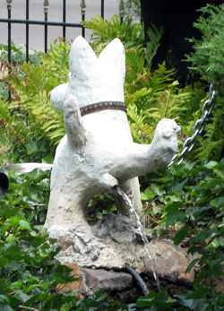 Peeing Dog Statue